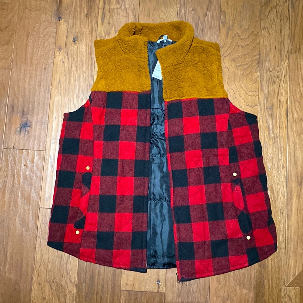 Maurice’s Buffalo plaid and Sherpa vest.